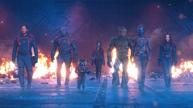Star-Lord (Chris Pratt), Drax (Dave Bautista), Rocket (Bradley Cooper), Gamora (Zoe Saldaña), Groot (Vin Diesel), Nebula (Karen Gillan), and Mantis (Pom Klementieff) prepare for battle in "Guardians of the Galaxy Vol. 3"