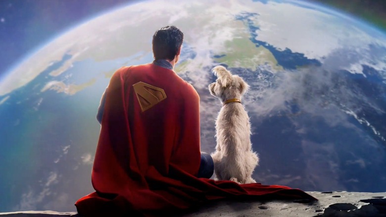 Superman (David Corenswet) sits on the moon next to Krypto in "Superman"