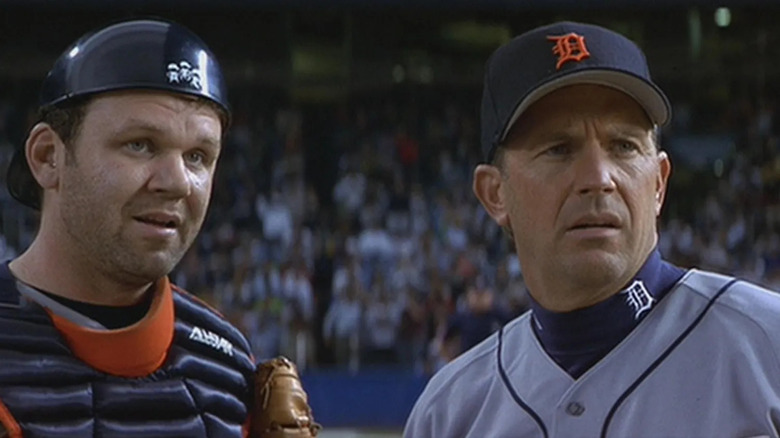 Gus Sinski standing next to Billy Chapel in For Love of the Game