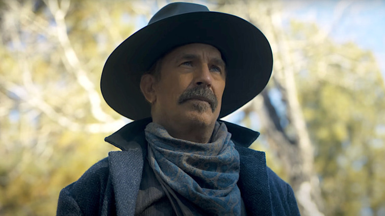Hayes Ellison (Kevin Costner) standing in a forest in "Horizon: An American Saga -- Chapter 1."