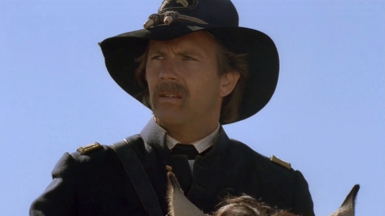 Dunbar (Kevin Costner) sitting on a horse in 