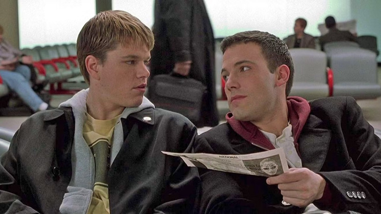 Loki (Matt Damon) looks at Bartleby (Ben Affleck) in an airport in Dogma