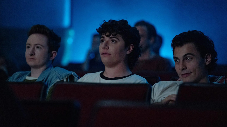 Reed Northup, Austin Zajur, and Nicholas Cirillo as Brian David, Burny, and Belly in a movie theater in The 4:30 Movie