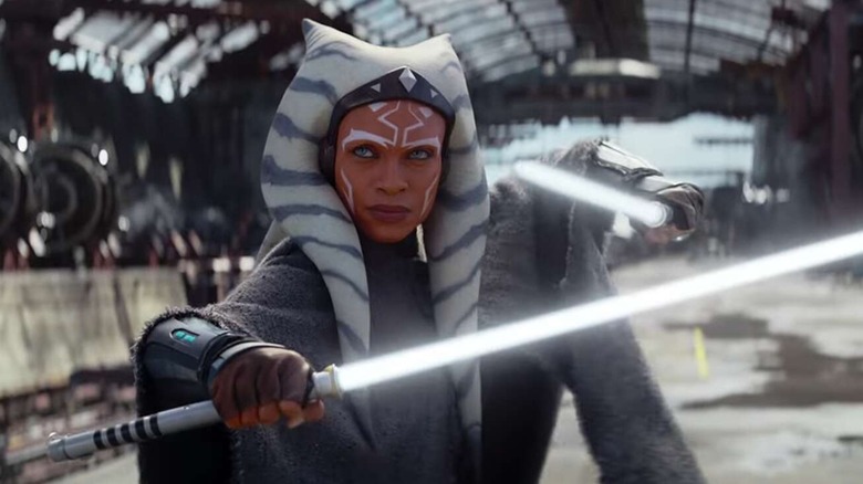Ahsoka stands poised with two white lightsabers