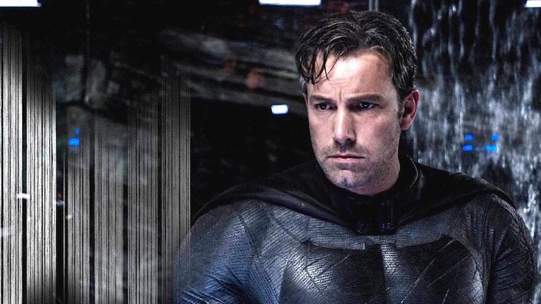 Bruce Wayne (Ben Affleck) stands in his Batman costume unmasked in Batman v. Superman: Dawn of Justice