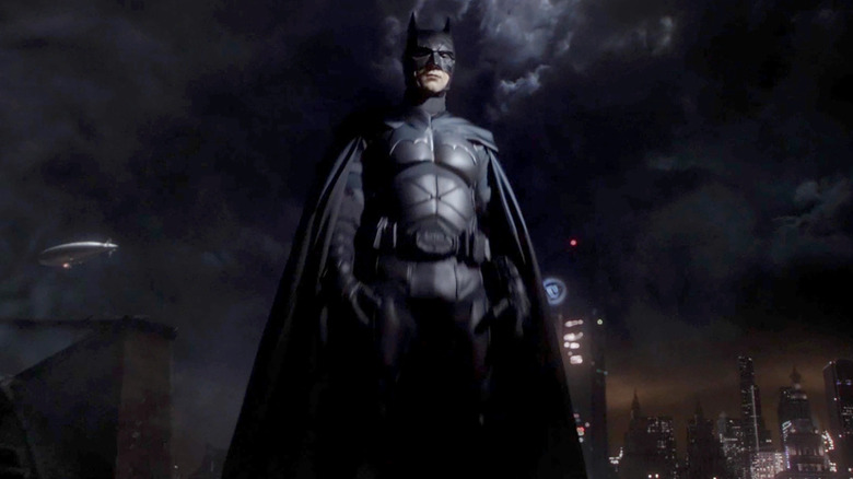 David Mazouz as Batman, looking down at Gotham City, on Gotham