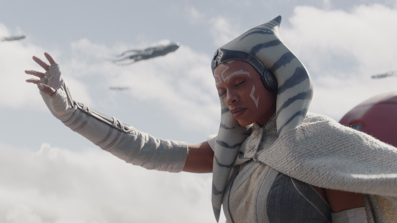 Ahsoka Tano reaching out through the Force to a pod of Purrgil in Ahsoka season 1