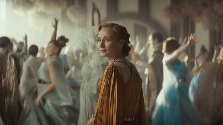 Mon Mothma looking back sadly before joining the dance at her daughter's wedding in Andor season 2