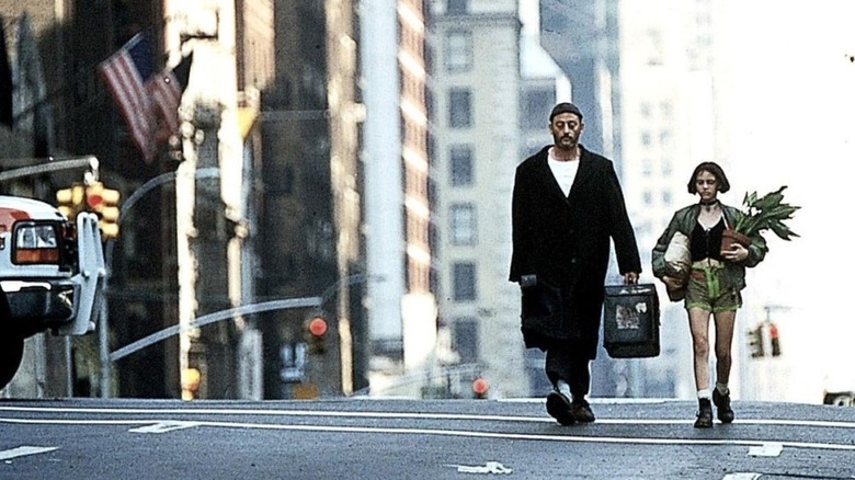Jean Reno and Natalie Portman waling in LEON