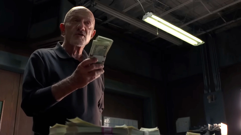 Jonathan Banks' Mike Ehrmantraut holding cash in Breaking Bad