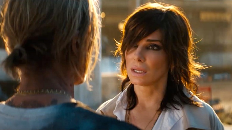 Sandra Bullock talks to Brad Pitt