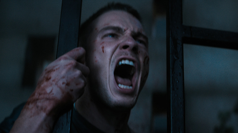 Hellraiser Trevor screaming behind bars