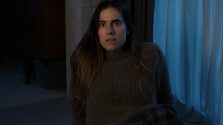 Gemma cowering on floor M3GAN