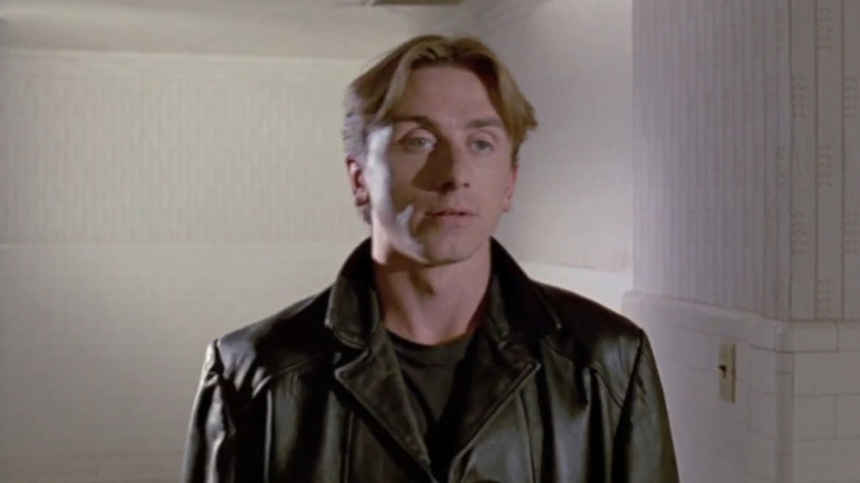 Mr. Orange wearing leather jacket