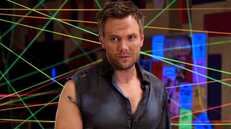 Joel McHale Jeff Winger Community ripped sleeve colored strings