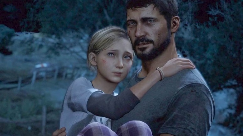 Joel holding Sarah in The Last of Us