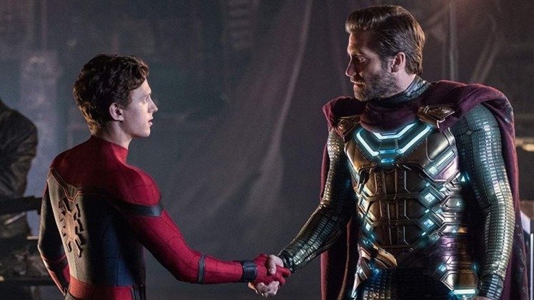 Tom Holland's Spider-Man shaking hands with Jake Gyllenhaal's Mysterio in Spider-Man: Far from Home