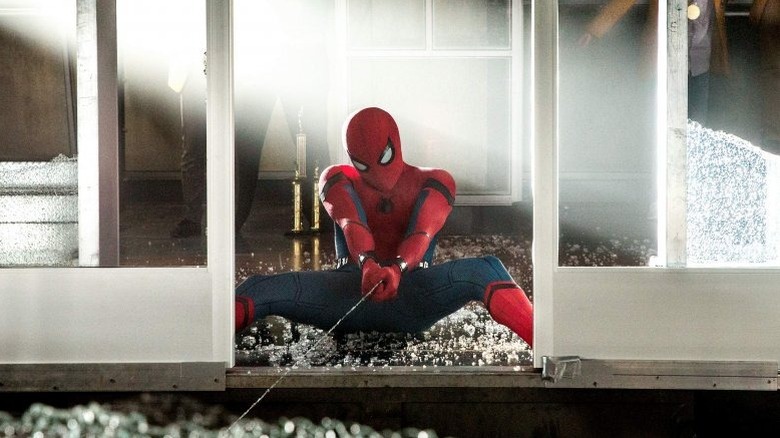Tom Holland's Spider-Man is holding on to a web in Spider-Man: Homecoming