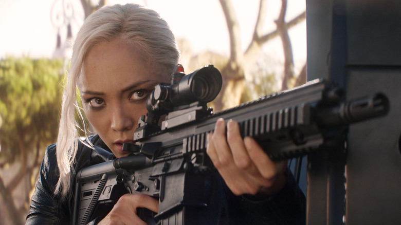 Pom Klementieff as Paris holding an assault rifle in Mission: Impossible – Dead Reckoning