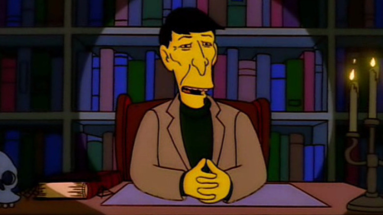 Leonard Nimoy sitting at a desk on The Simpsons.