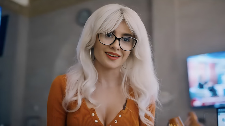 Cat Grant (Mikaela Hoover) cocking her head sideways in Superman (2025).
