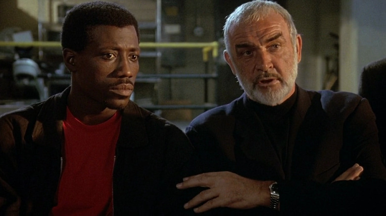 John Conner (Sean Connery) and Web Smith (Wesley Snipes) investigate a crime scene in Rising Sun