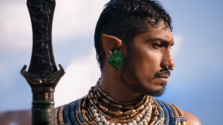Black Panther: Wanda Forever's Tenoch Huerta scowling
