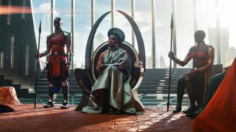 Black Panther: Wakanda Forever's Ramonda on throne with guards