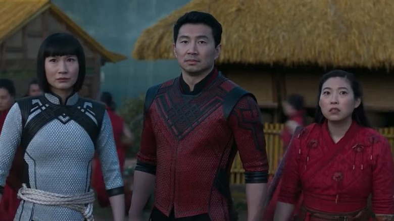 Shang-Chi and The Legend of the Ten Rings' Shang Chi, Katy, and  Xu standing shocked