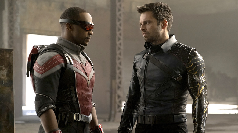 The Falcon and Winter Soldier's Anthony Mackie and Sebastian Stan staring at each other