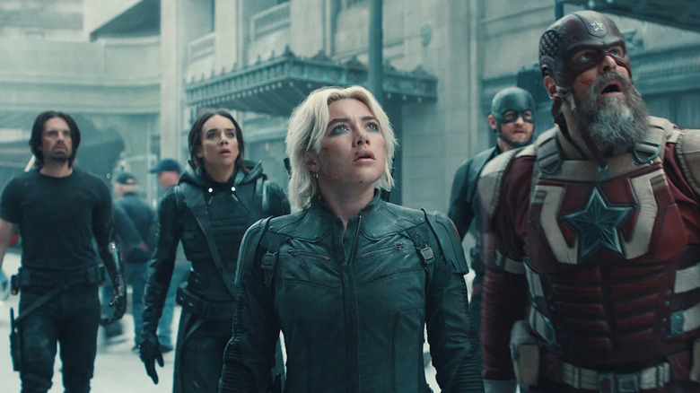 The Thunderbolts stand on the street in New York, looking up at the Void in Thunderbolts
