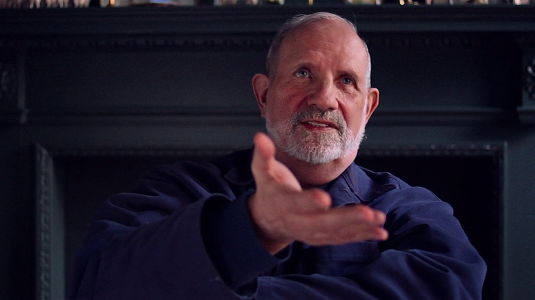 Brian De Palma hand extended