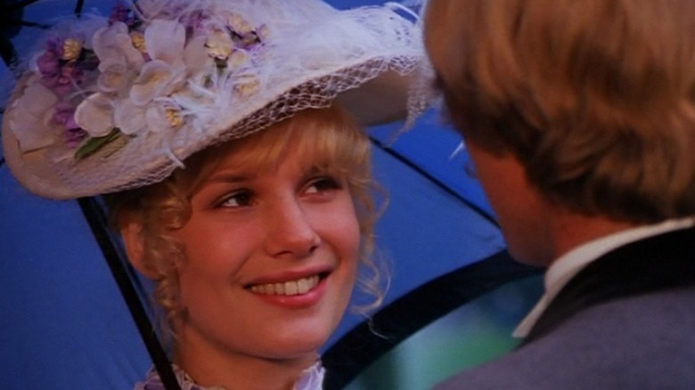 Monique van de Ven wearing a hat with flowers in Keetje Tippel