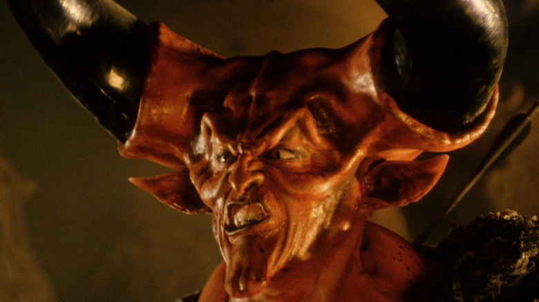 Tim Curry as Darkness in Legend