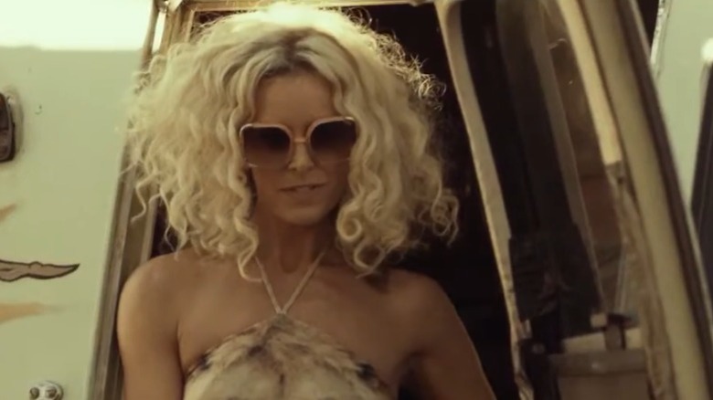 Woman smiling in sunglasses
