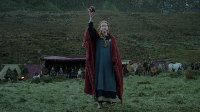 Woman holding ball in The Northman