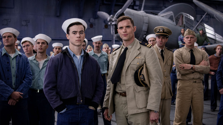 Sailors and pilots on a WWII aircraft carrier