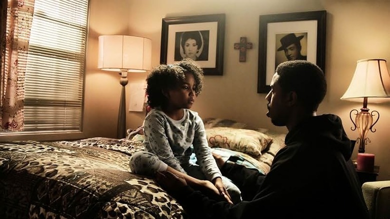 Oscar Grant (Michael B. Jordan) shares a moment with his daughter (Ariana Neal) in "Fruitvale Station"