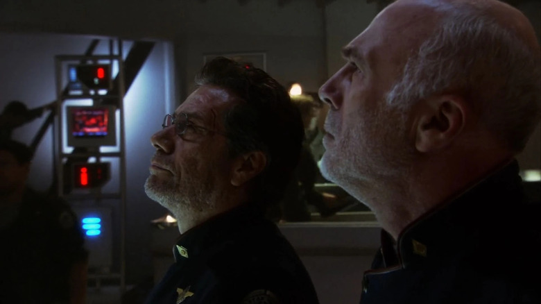 Commander William Adama and Colonel Saul Tigh looking up in Battlestar Galactica episode 33