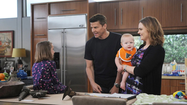 David Boreanaz as Booth talks with his family including Emily Deschanel as Brennan in Bones