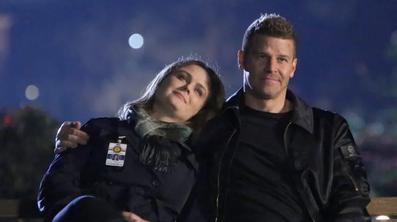 Emily Deschanel as Brennan leans her head against David Boreanaz as Booth in Bones
