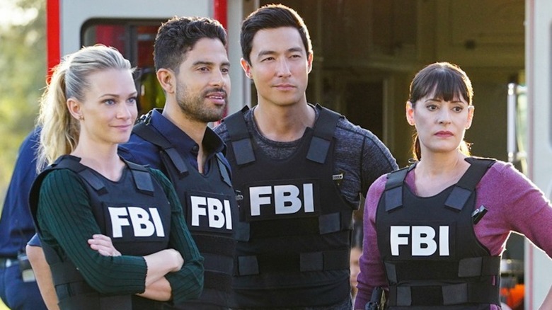 Criminal Minds' Matthew, JJ, Emily, and Luke smiling