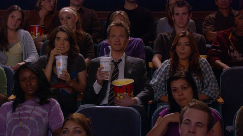 Robin, Barney, and Lily watch "The Wedding Bride"