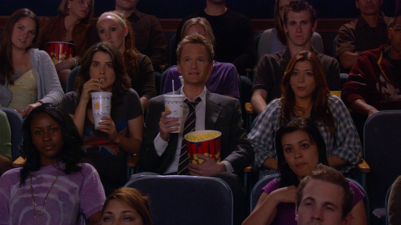 Robin, Barney, and Lily watch "The Wedding Bride"
