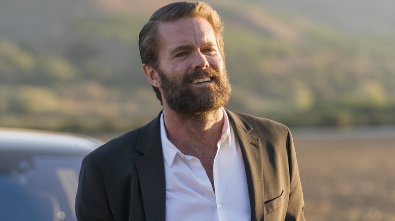 Garret Dillahunt smiles as Ty Walker in Justified