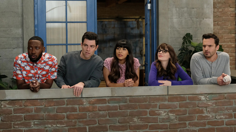 Winston Schmidt Cece Jess and Nick on a balcony looking out on New Girl
