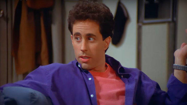 Seinfeld smirking