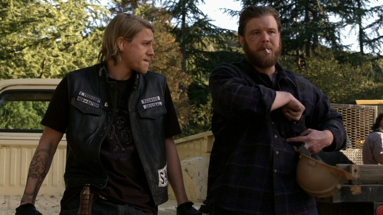 Charlie Hunnam and Ryan Hurst sitting Sons of Anarchy