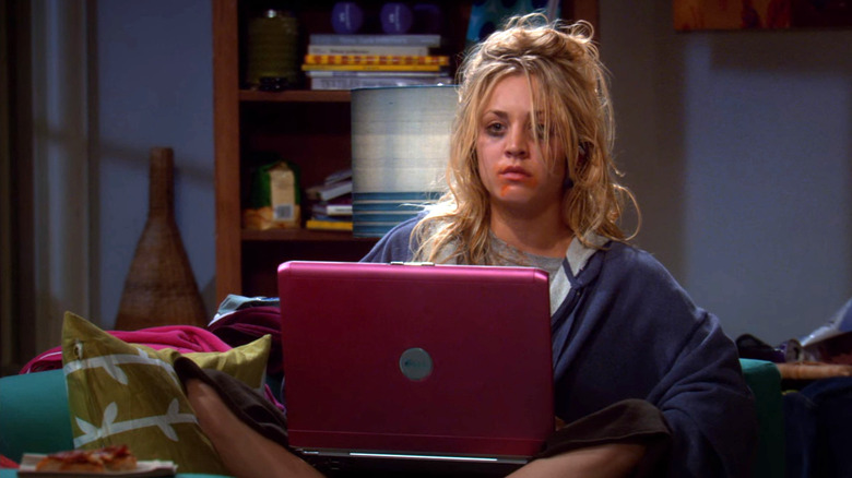 Penny looking like a mess in front of her computer on The Big Bang Theory