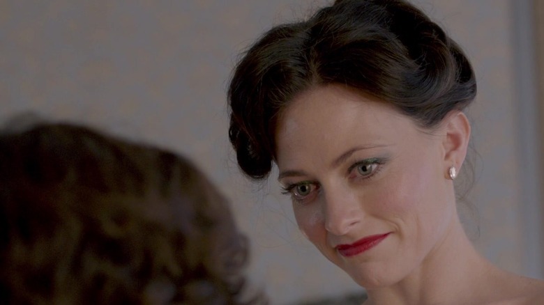 Irene naked standing over Sherlock